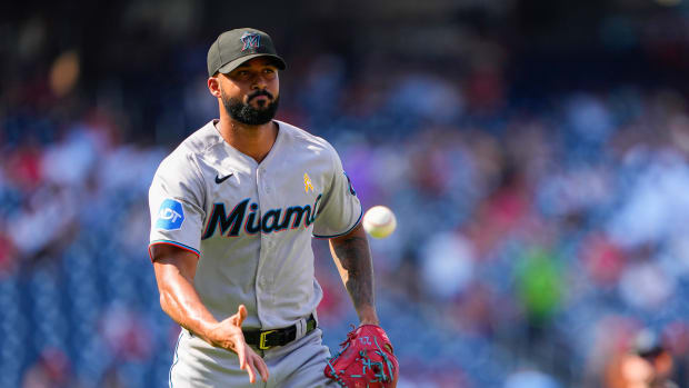 Sep 3, 2023; Washington, District of Columbia, USA; Miami Marlins pitcher Sandy Alcantara (22) tosses to first base to record an out against the Washington Nationals during the sixth inning at Nationals Park. Mandatory Credit: Gregory Fisher-USA TODAY Sports  